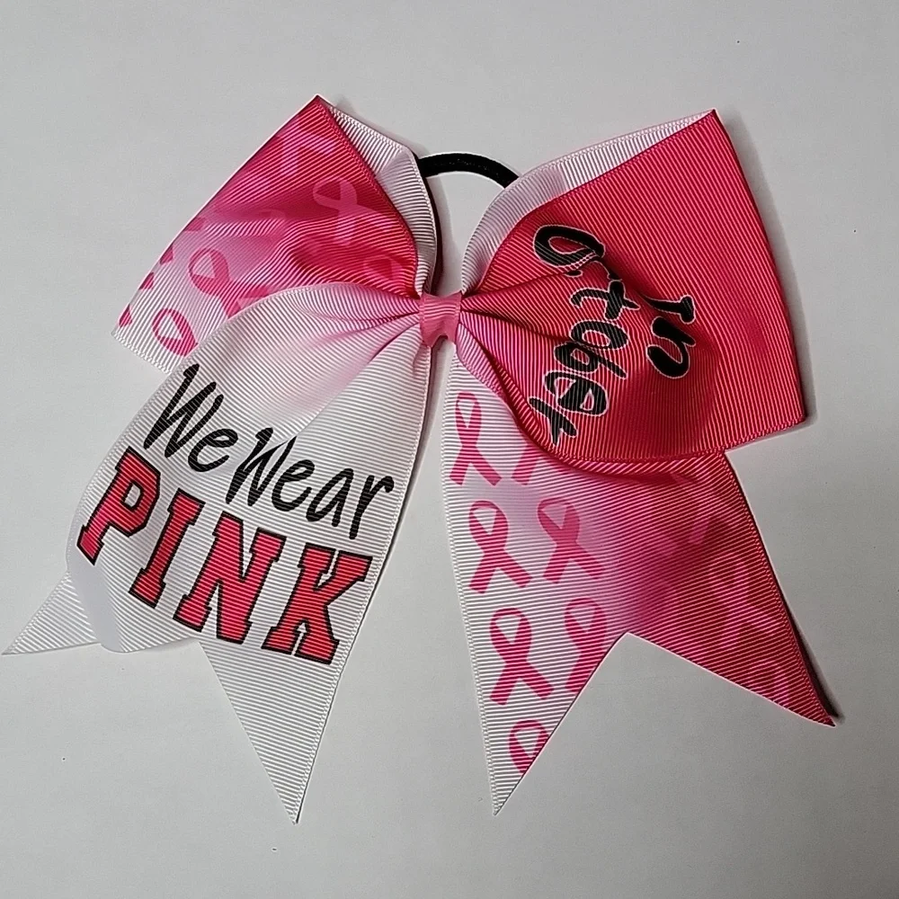 Girls bow Breast Cancer Awareness